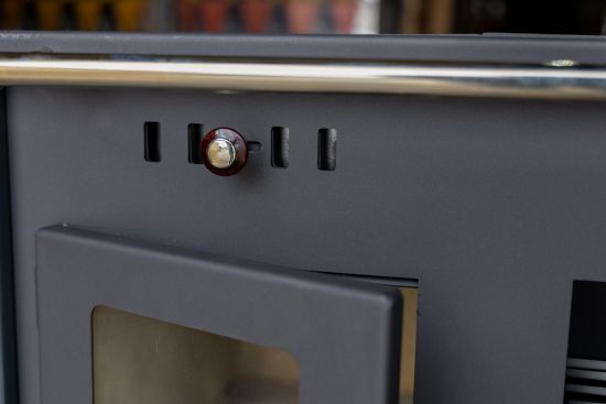 EEK A+ Wood-burning stove with baking compartment and hob Pracktik Lux Anthracite RAL 7016 RIGHT Wood-burning stove 9.5 kW Wood-burning stove Permanent wood-burning stove Workshop stove Swedish stove Cottage stove Heating stove