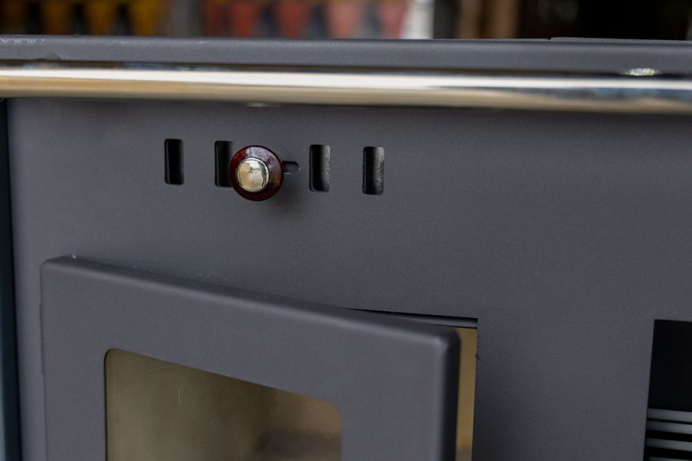 EEK A+ Wood-burning stove with baking compartment and hob Pracktik Lux Anthracite RAL 7016 RIGHT Wood-burning stove 9.5 kW Wood-burning stove Permanent wood-burning stove Workshop stove Swedish stove Cottage stove Heating stove